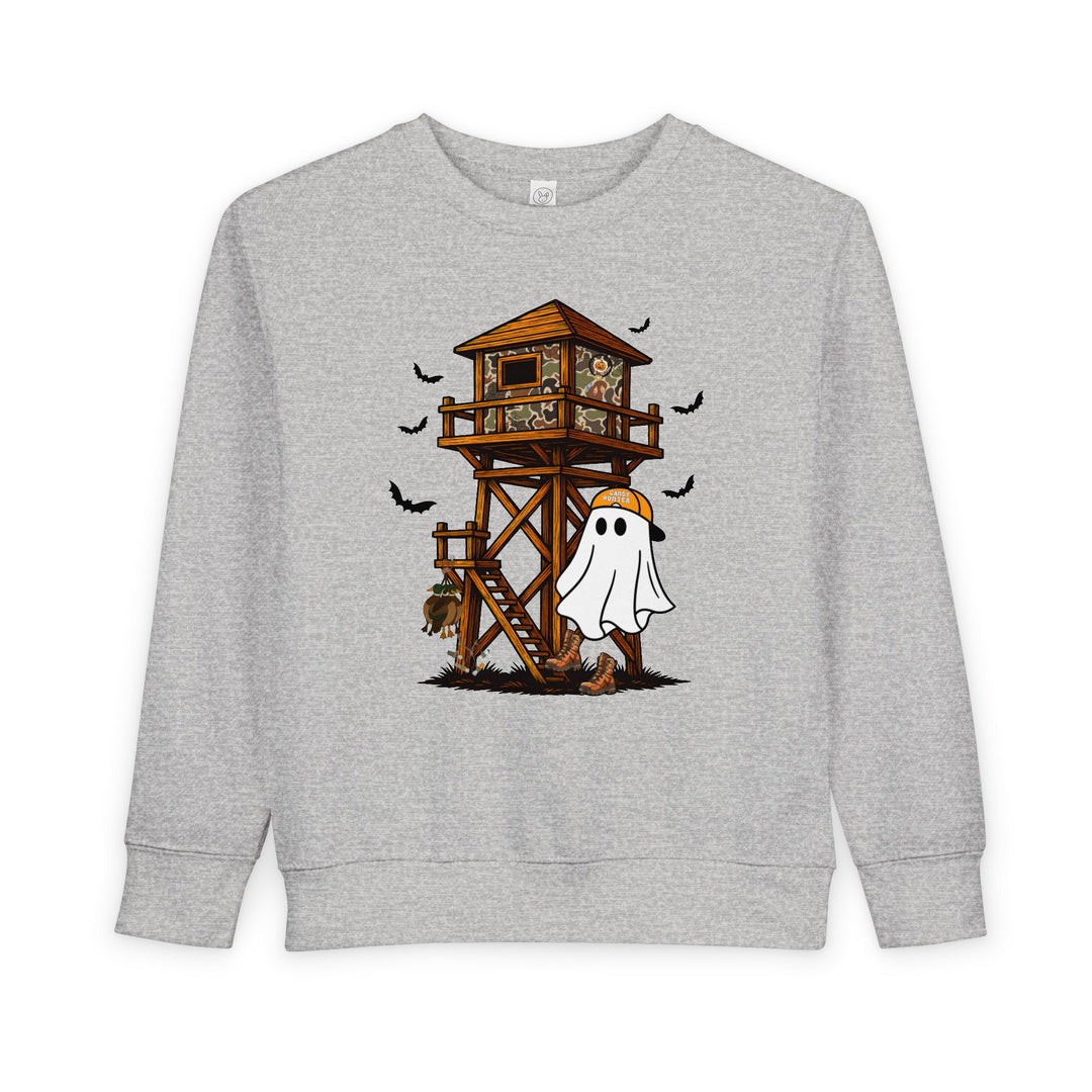 Ghost Hunter Toddler Crew: Light-gray sweatshirt features a cartoon ghost in hunting boots and cap, with a Halloween-themed hunting stand graphic, perfect for cozy toddler adventures.
