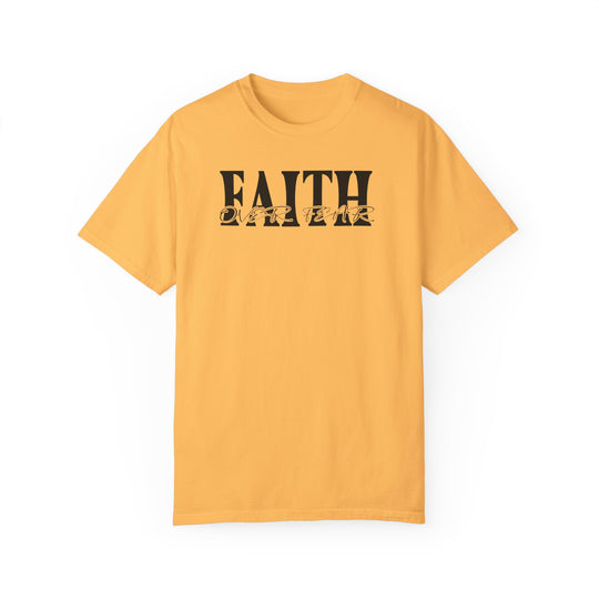 A yellow Faith Over Fear Tee, crafted from 100% ring-spun cotton. Garment-dyed for extra coziness, with a relaxed fit and durable double-needle stitching. No side-seams for a tubular shape.