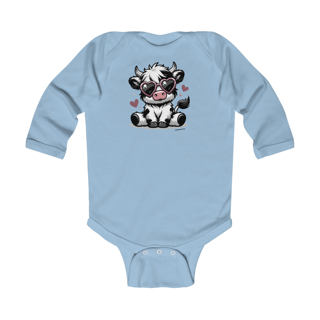 A cute cow-themed long sleeve onesie for infants, featuring a cartoon cow wearing sunglasses. Made of soft 100% cotton, with ribbed bindings for durability and plastic snaps for easy changing. From Worlds Worst Tees.