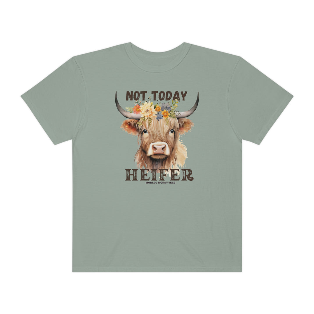 A relaxed-fit t-shirt featuring a cow with flowers design, titled Not Today Heifer Tee. Made of 100% ring-spun cotton, garment-dyed for extra coziness and durability. No side-seams for a tubular shape.