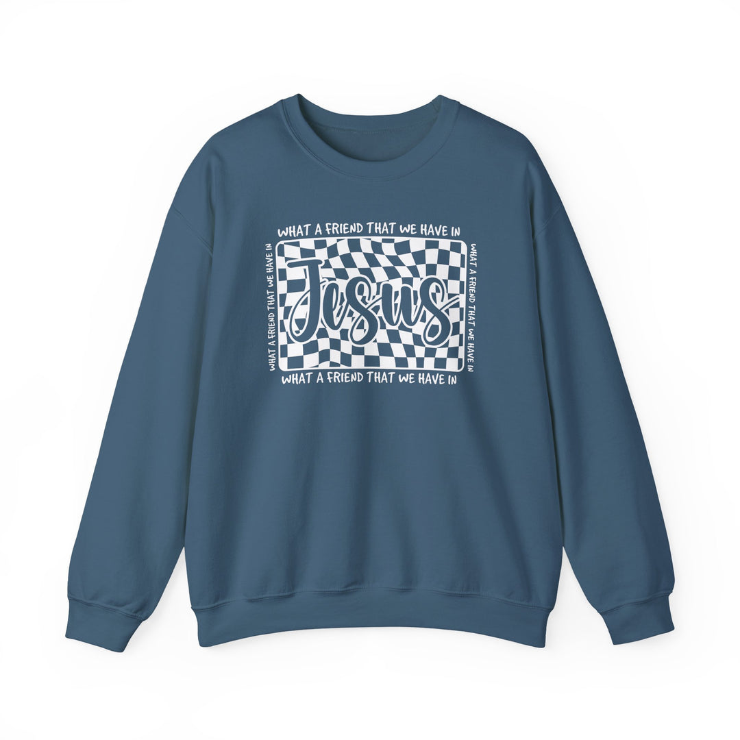 Blue crew-neck sweatshirt featuring a wavy checkerboard graphic with Jesus in script, surrounded by What a friend that we have in. Ideal for colder months.