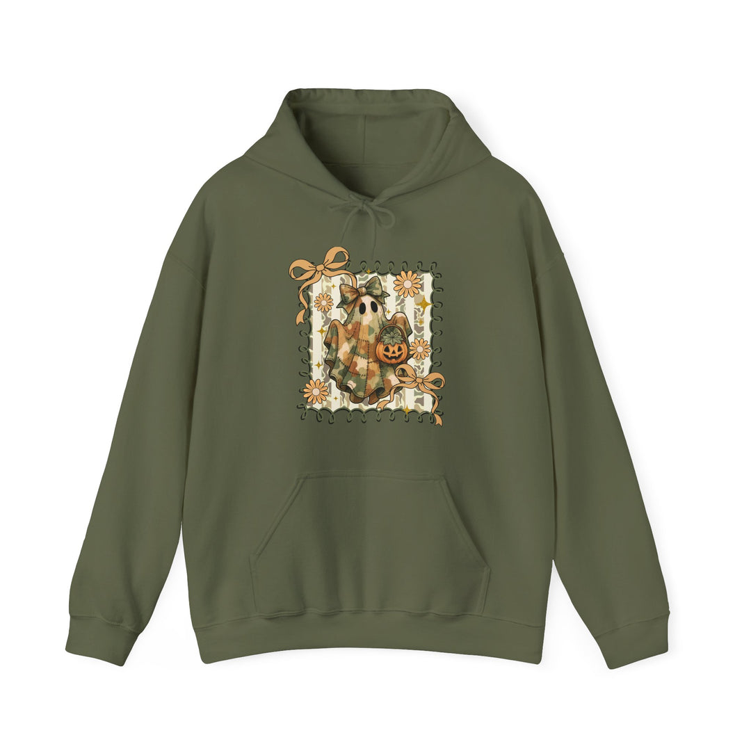 Quilted Ghost Hoodie features a cute ghost in plaid with a jack-o’-lantern, framed by daisies and bows, on an olive-green background.