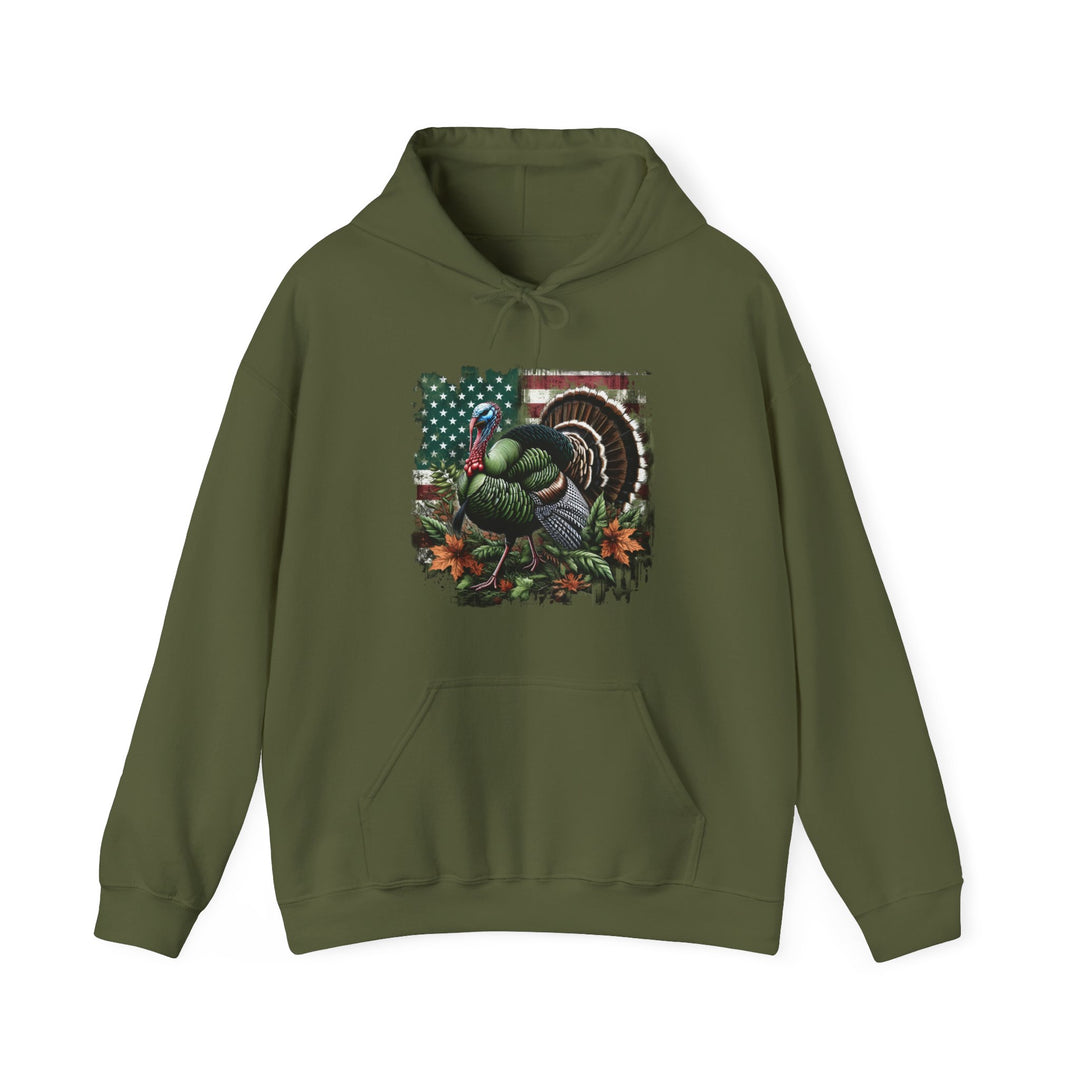 A green sweatshirt featuring a turkey design, ideal for hunting enthusiasts. Unisex heavy blend for comfort, cotton-polyester mix, kangaroo pocket, and drawstring hood. Perfect for warmth and style.