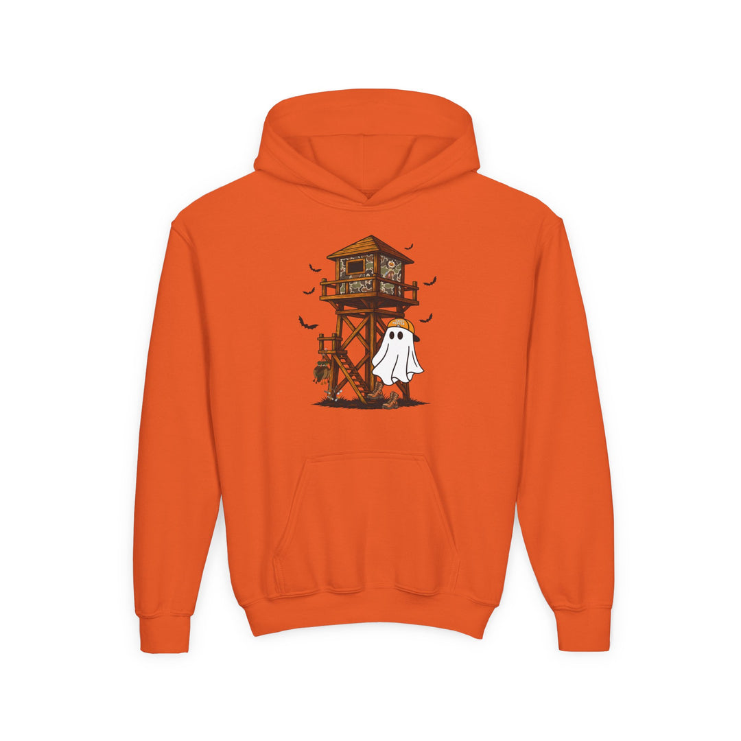 Ghost Hunter Youth Hoodie features a Halloween graphic of a ghost, bats, hunting tower, skulls, and pumpkins on an orange hooded sweatshirt with a kangaroo pocket.