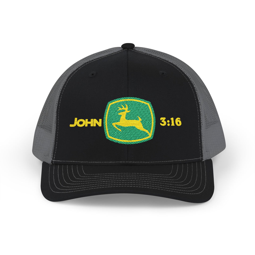 John 3:16 Snapback Trucker Cap with a green-and-yellow leaping-deer shield, black front, gray mesh back, and adjustable snap closure for comfort and style.