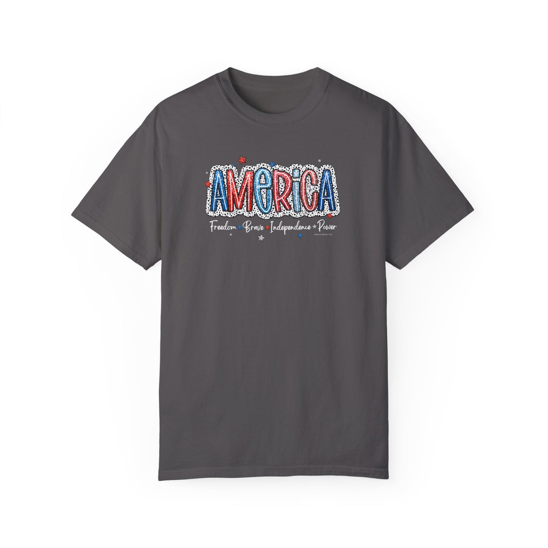 America Tee: Garment-dyed t-shirt in ring-spun cotton, medium weight, relaxed fit. Double-needle stitching, seamless design for durability and comfort. From 'Worlds Worst Tees'.