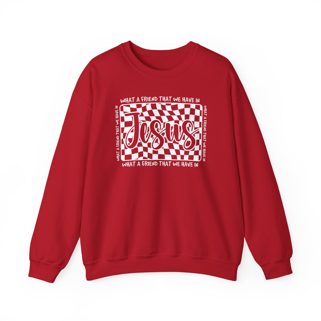 Red crewneck sweatshirt with What a Friend We Have in Jesus graphic, featuring bold Jesus text on a wavy checkerboard. Christian-themed, cozy cotton-polyester blend.