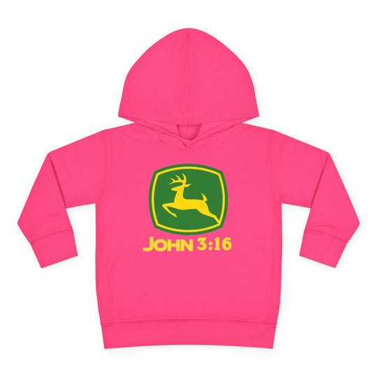 John 3:16 Toddler Hoodie features a bright pink design with a front green-and-yellow shield, leaping deer silhouette, and side-seam pockets for comfort.