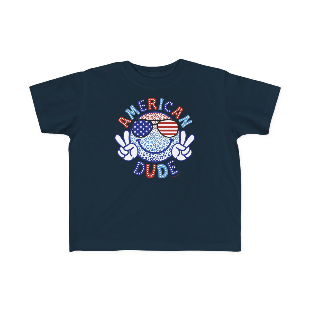 American Dude Toddler Tee featuring a cartoon character face and peace sign. Soft 100% combed ringspun cotton, light fabric, classic fit. Sizes: 2T, 3T, 4T, 5-6T. Ideal for sensitive skin.