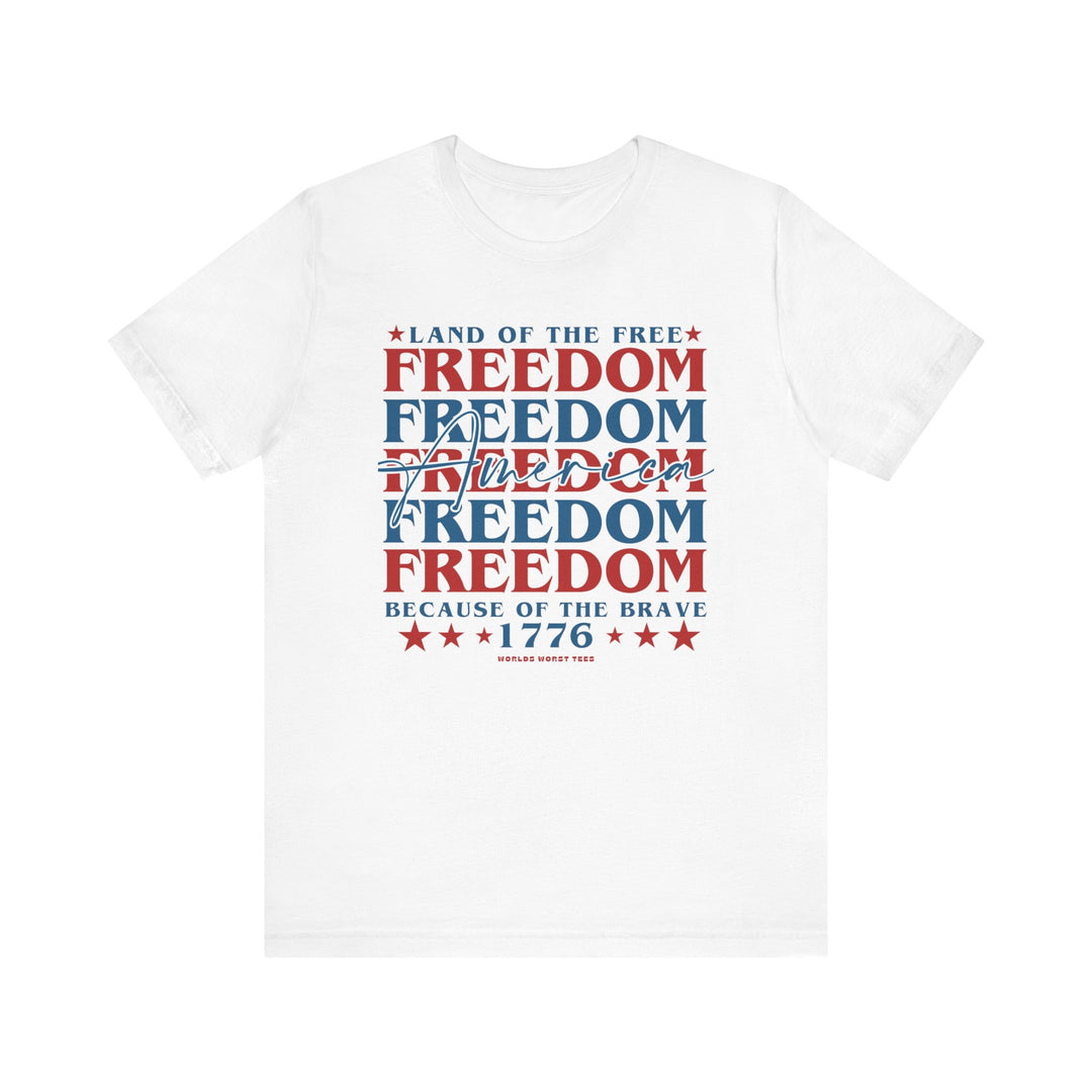 American Freedom Tee: White unisex jersey t-shirt with red and blue text. Soft cotton, ribbed knit collar, and shoulder taping for durability. Retail fit, 100% Airlume combed cotton, 4.2 oz fabric weight.