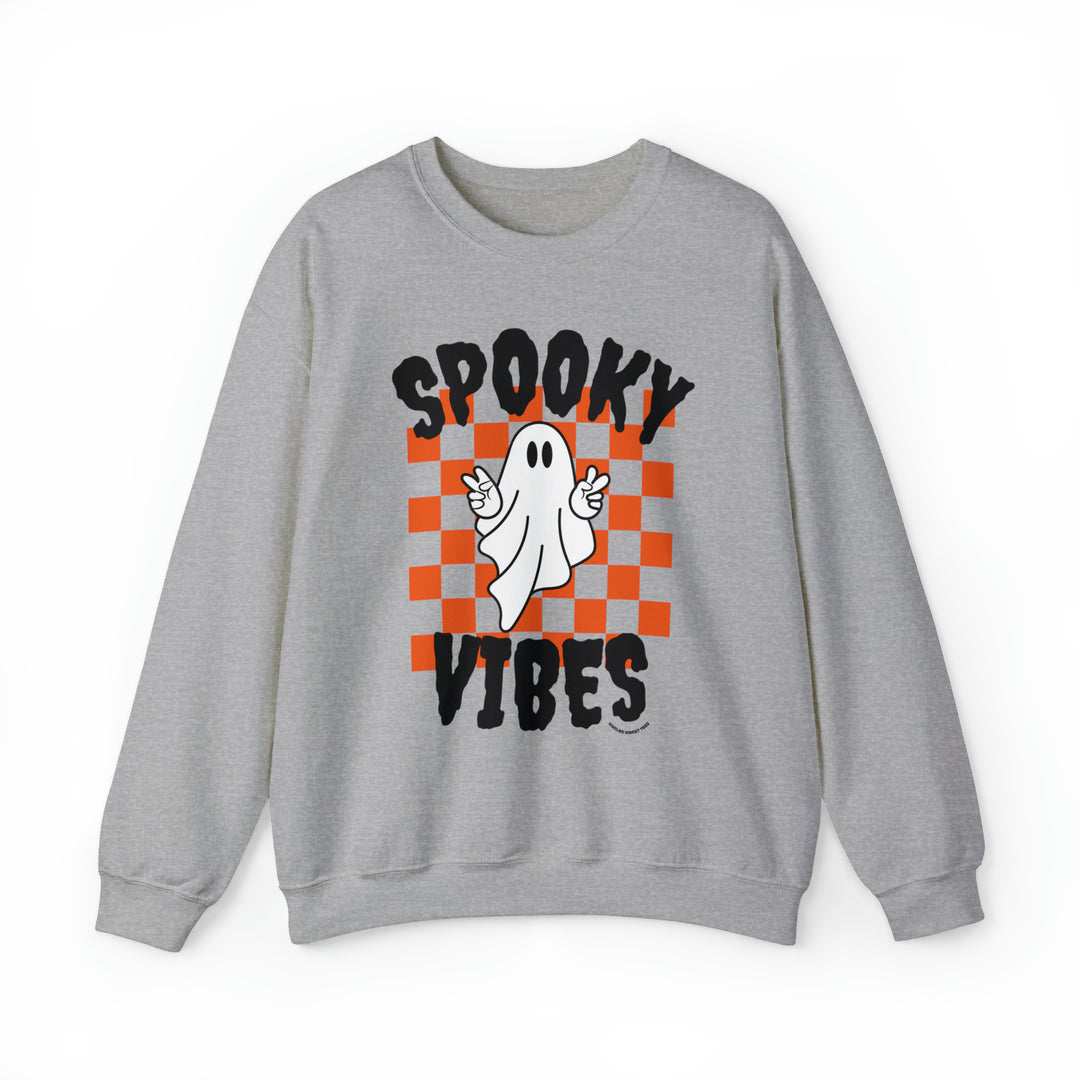 A grey sweatshirt featuring a ghost design, part of the SPOOKY VIBES CREW collection at Worlds Worst Tees. Unisex heavy blend fabric, ribbed knit collar, loose fit, and sewn-in label. Sizes S to 5XL.