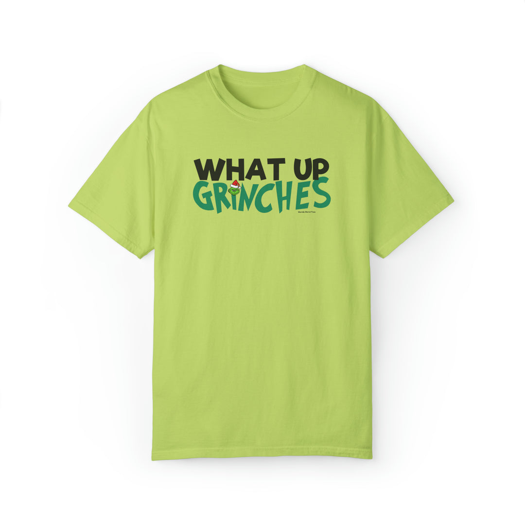 A green t-shirt with a playful What up Grinches logo, embodying comfort and style. Unisex, ring-spun cotton blend with a relaxed fit and rolled-forward shoulder. From Worlds Worst Tees.