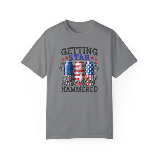 A grey Star Spangled Hammered Tee, 100% ring-spun cotton, medium weight, relaxed fit, double-needle stitching for durability, seamless design for comfort.