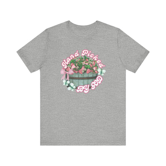 Hand Picked by GOD Tee, a classic unisex jersey short sleeve shirt, featuring ribbed knit collars and dual side seams for durability and comfort.