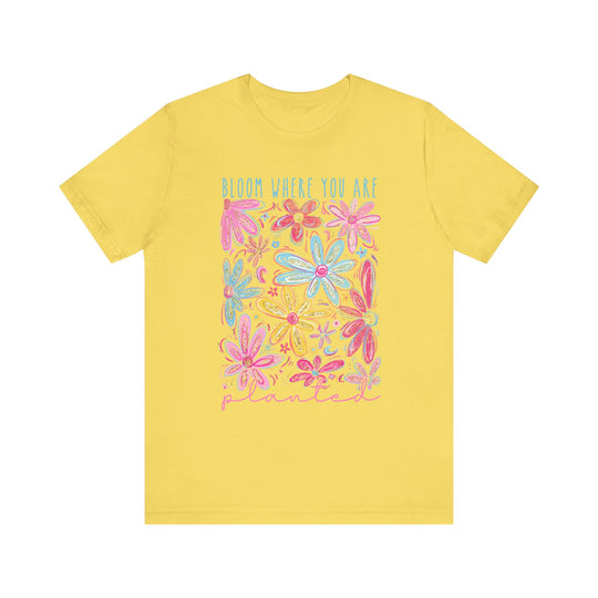 Unisex Bloom Where You Are Planted tee, featuring a classic crew neckline, ribbed knit collars, and tapered shoulders for a comfortable, stylish fit.