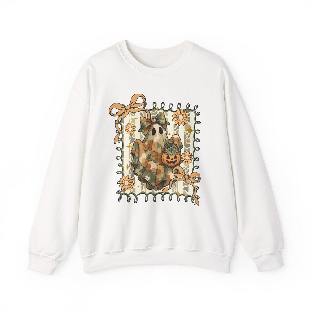 White crew-neck sweatshirt featuring a patchwork ghost with a bow, holding a jack-o’-lantern bucket, surrounded by vine border and daisies. Cozy, durable design.