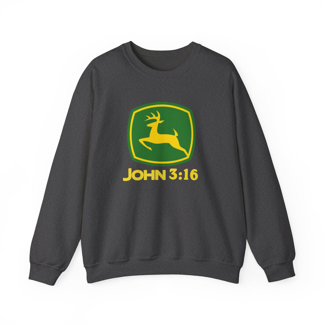 Dark-gray crewneck sweatshirt featuring a green-and-yellow deer logo with John 3:16, blending farm brand style with a Bible verse reference.