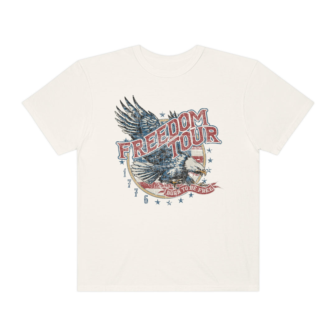 Freedom Tour Tee: White t-shirt with an eagle graphic. 100% ring-spun cotton, garment-dyed for coziness. Relaxed fit, double-needle stitching for durability. Ideal for daily wear.