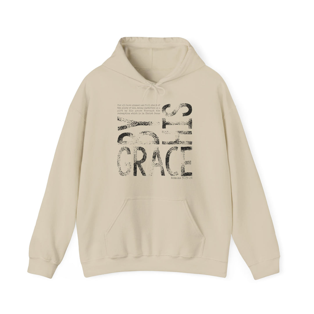 Light-beige hoodie with “GOD’S GRACE” graphic and Romans 3:23-24 quote, featuring a kangaroo pocket and drawstring hood, ideal for warmth and comfort.
