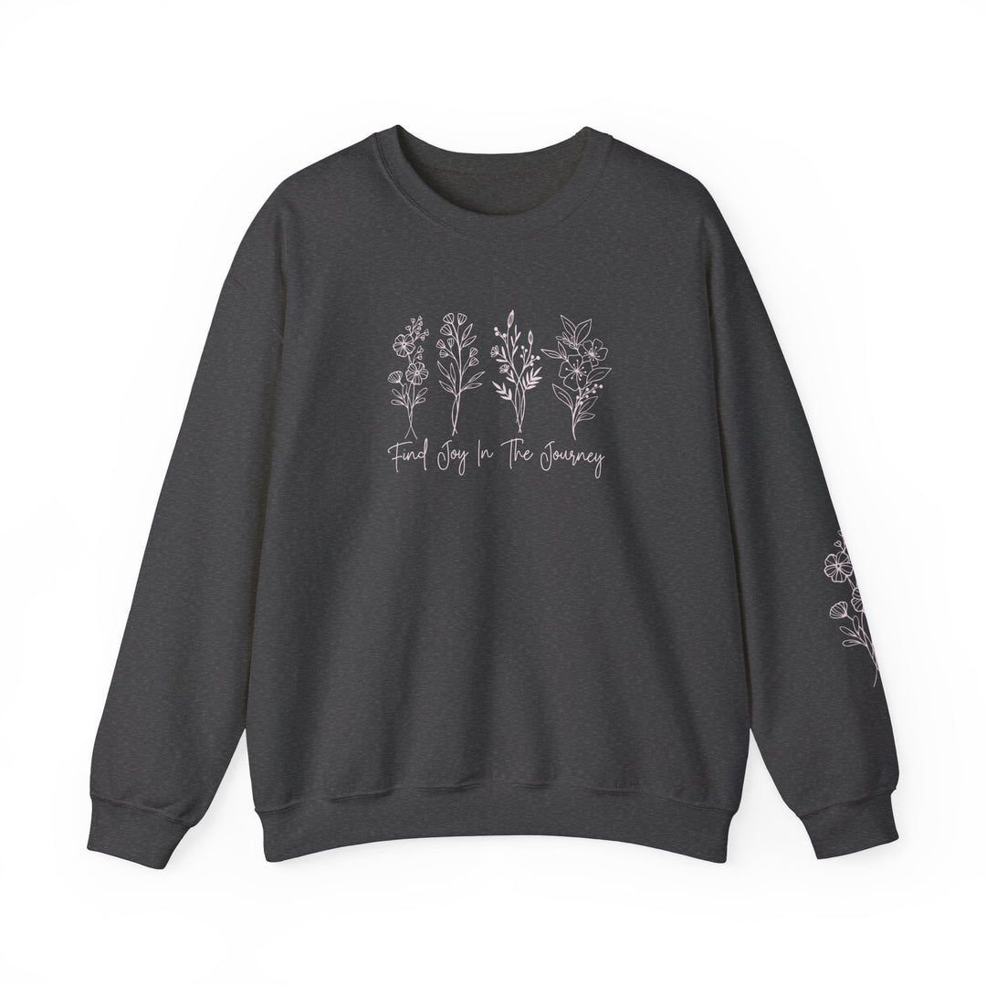 A unisex heavy blend crewneck sweatshirt featuring the 'Find Joy in the Journey Crew' design. Made of 50% cotton and 50% polyester, with ribbed knit collar, no itchy side seams, and a loose fit.