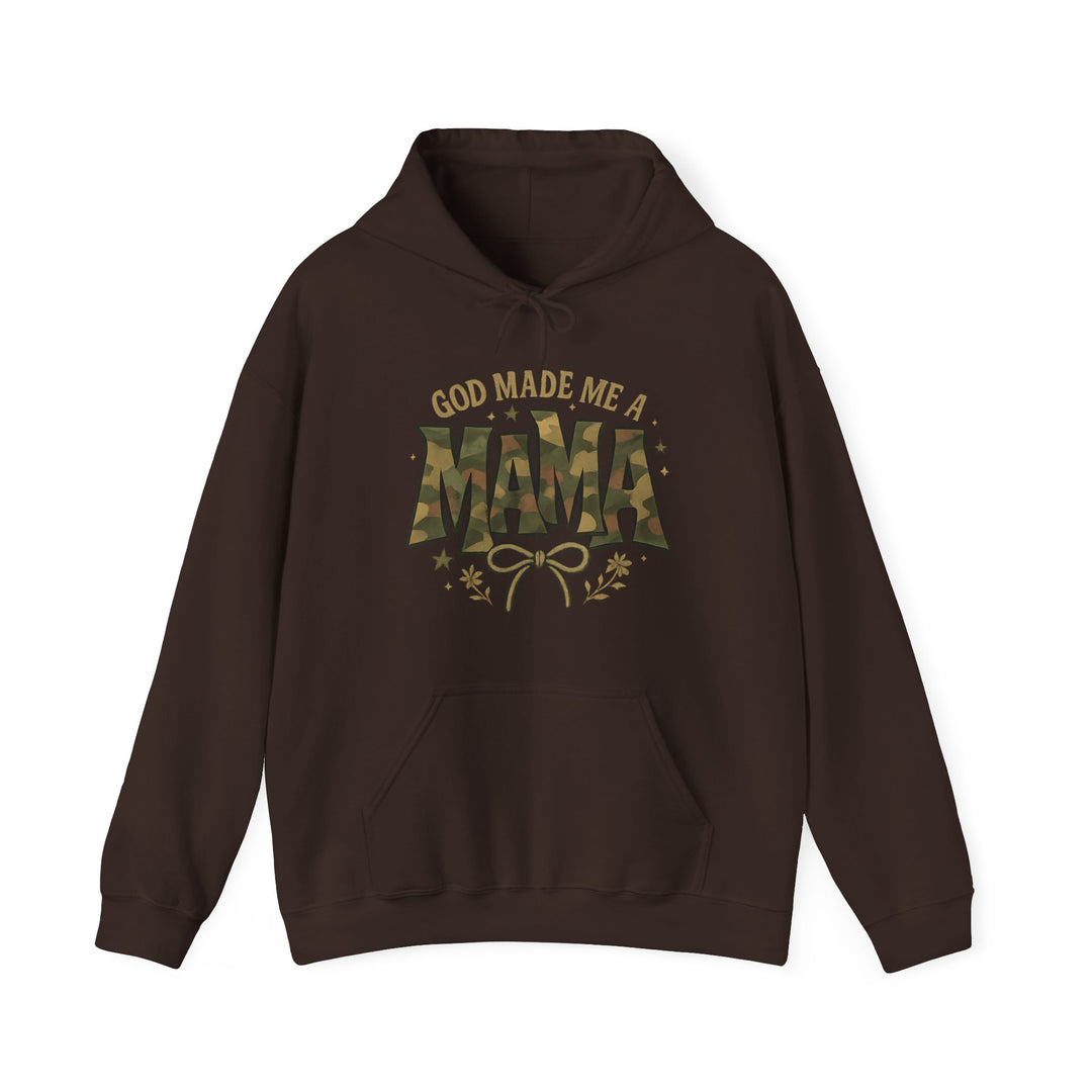 God Made Me a Mama Hoodie features a camouflage MAMA text on a dark brown pullover with gold accents and a kangaroo pocket, ideal for cozy, stylish wear.
