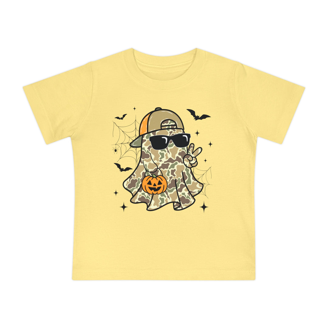 Candy Ghost Baby Tee featuring a camo-pattern ghost with sunglasses, peace sign, and jack-o’-lantern, surrounded by bats and stars. Super soft, durable, and shrink-resistant.