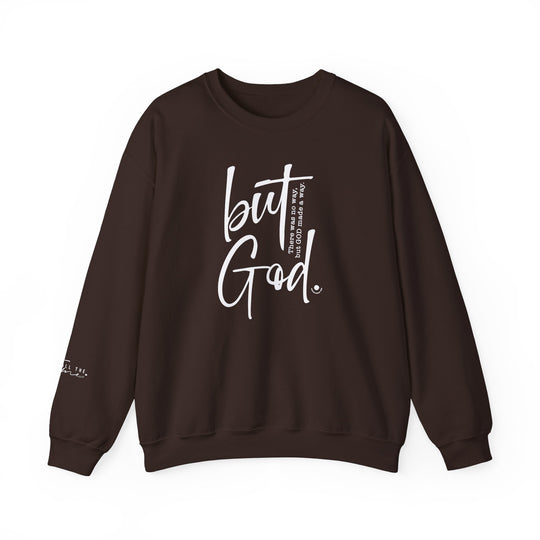 A unisex heavy blend crewneck sweatshirt featuring the title But God Crew. Made from 50% cotton and 50% polyester, with ribbed knit collar and double-needle stitching for durability. Comfortable and cozy for colder months.