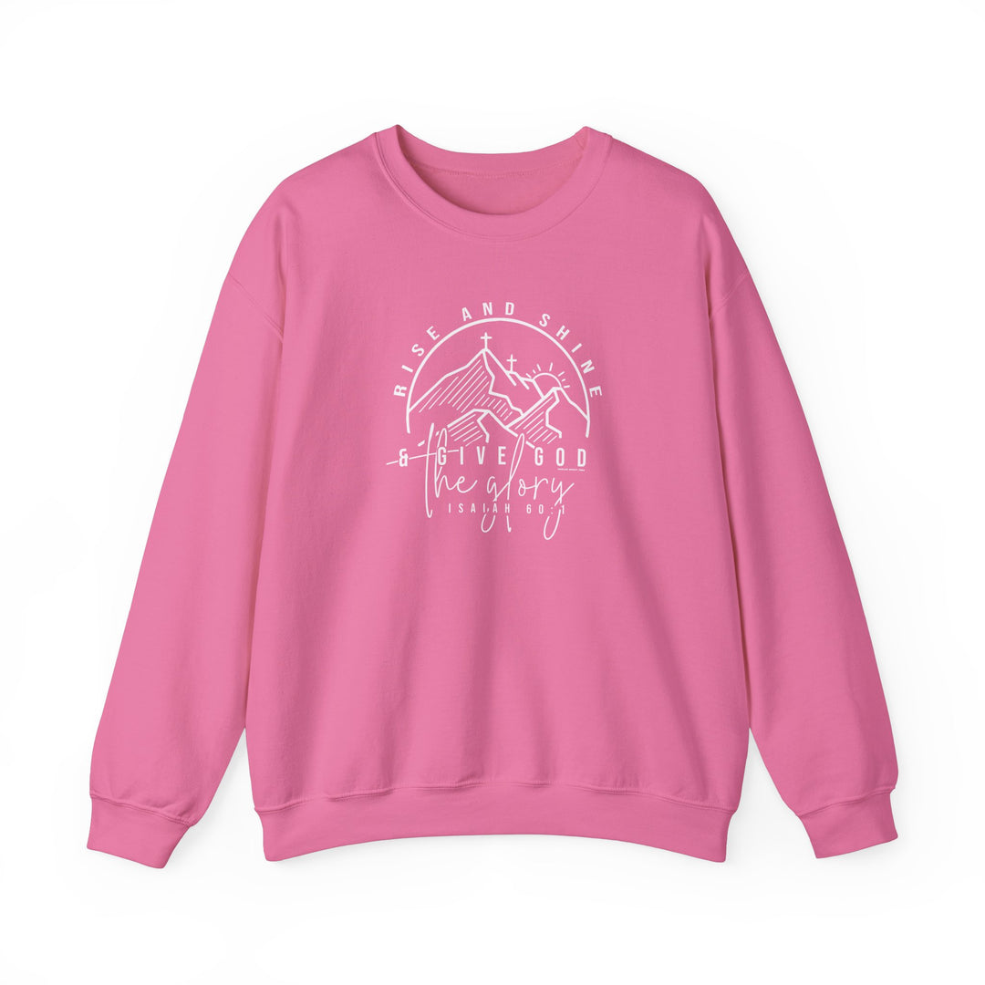 Unisex Rise and Shine Crew sweatshirt, pink with white text, featuring a cross and mountains design. Heavy blend fabric, ribbed knit collar, no itchy seams. Sizes S-5XL. Ideal for comfort in any situation.