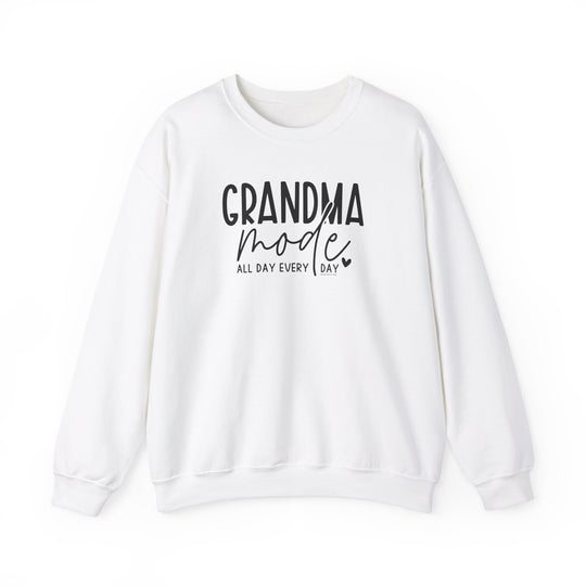 A unisex heavy blend crewneck sweatshirt, Grandma Mode Crew, in white with black text. Made of 50% cotton, 50% polyester, ribbed knit collar, no itchy side seams, loose fit, medium-heavy fabric. Sizes S-5XL.