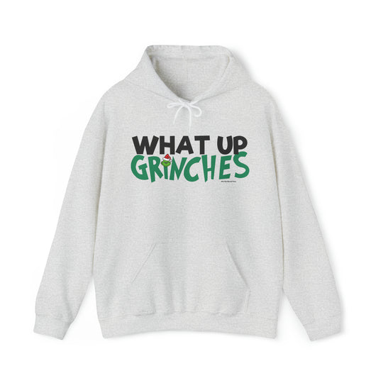 Unisex What up Grinches Hoodie, white with green and black text. Heavy blend cotton and polyester, kangaroo pocket, drawstring hood. Classic fit, tear-away label, runs true to size.