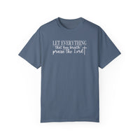 A relaxed-fit Let Everything That Has Breath Praise the Lord Tee, crafted from 100% ring-spun cotton. Garment-dyed for coziness, featuring double-needle stitching for durability and a seamless design for a tubular shape.