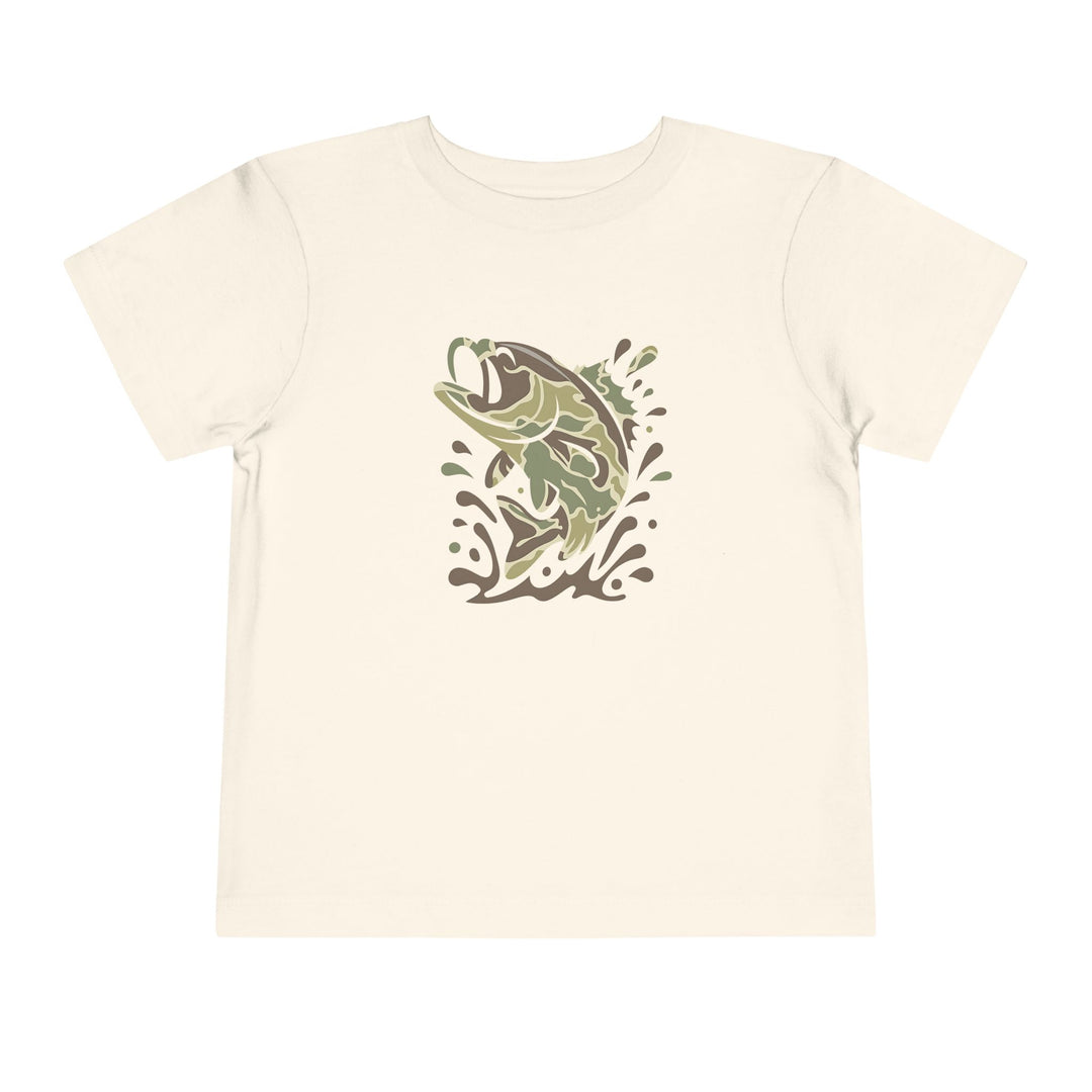 Camo Fish Toddler Tee featuring a stylized bass leaping from water on a light-cream shirt, crafted from 100% Airlume cotton for comfort.