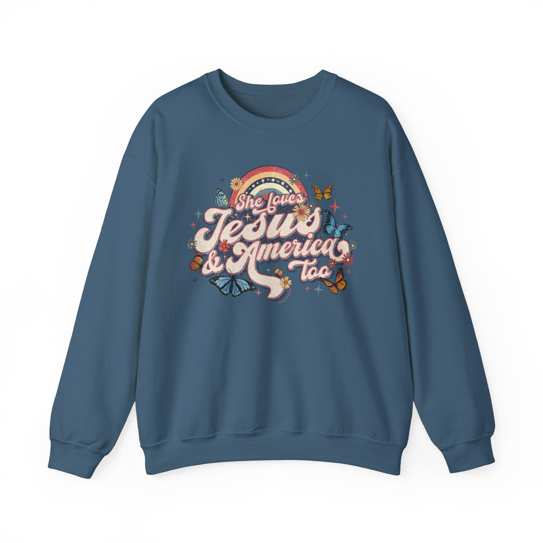 A blue sweatshirt featuring the She Loves Jesus and America crew design. Unisex heavy blend with ribbed knit collar, seamless sides, and cotton-polyester fabric for comfort and durability. Sizes from S to 5XL.