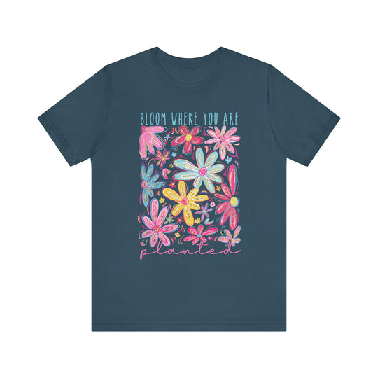 Bloom Where You Are Planted Tee: Classic unisex cotton tee with ribbed knit collar, tapered shoulders, and dual side seams for lasting shape and comfort.