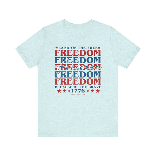 A classic American Freedom Tee in white with red and blue text. Unisex jersey shirt with ribbed knit collar, Airlume combed cotton, and retail fit. Sizes XS to 3XL.