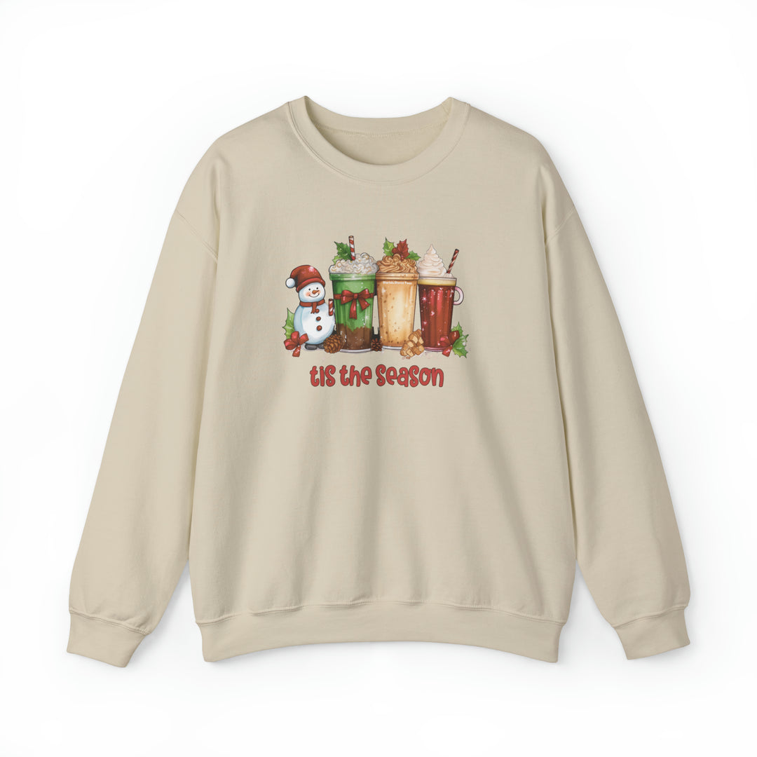 A cozy unisex Christmas crewneck sweatshirt featuring a snowman and drinks design. Made of 50% cotton and 50% polyester, with ribbed knit collar for lasting comfort. Ideal for festive vibes.