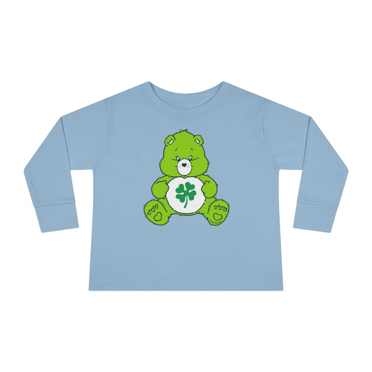 A durable Lucky Bear Toddler Long Sleeve Tee made of 100% cotton, featuring a green bear with a clover cartoon, perfect for active kids. Designed for comfort and longevity with ribbed collar and EasyTear™ label.