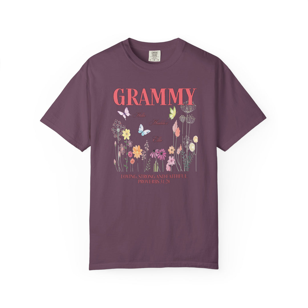 Grammy Tee: Purple shirt featuring floral and butterfly designs, made from soft, durable ring-spun cotton, offering a relaxed fit for everyday comfort.