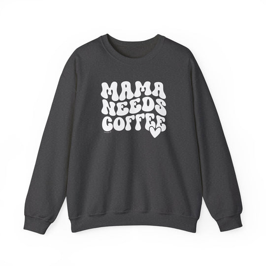A cozy Mama Needs Coffee Crew sweatshirt in grey with white text. Unisex heavy blend fabric, ribbed knit collar, no itchy seams. Ideal for comfort, featuring 50% cotton, 50% polyester.