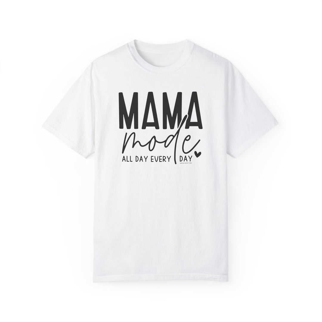 A relaxed-fit Mama Mode Tee in white, featuring black text. Made from 100% ring-spun cotton for comfort and durability. Double-needle stitching and seamless design for lasting quality.