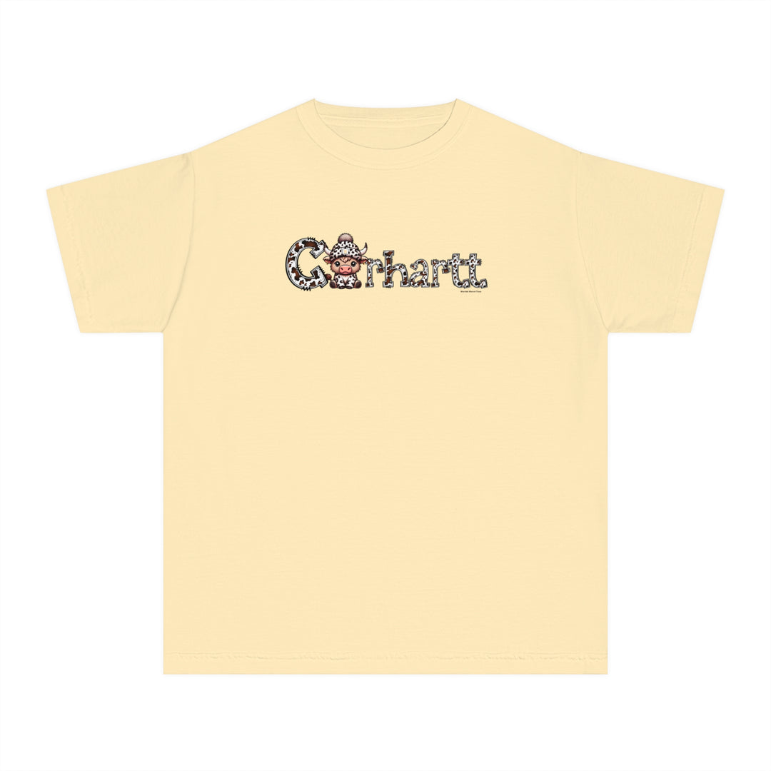 A yellow Cowhartt Cow Kids Tee featuring a cartoon cow with horns and a hat. Made of 100% combed ringspun cotton, soft-washed, and garment-dyed for comfort and durability. Perfect for active kids.