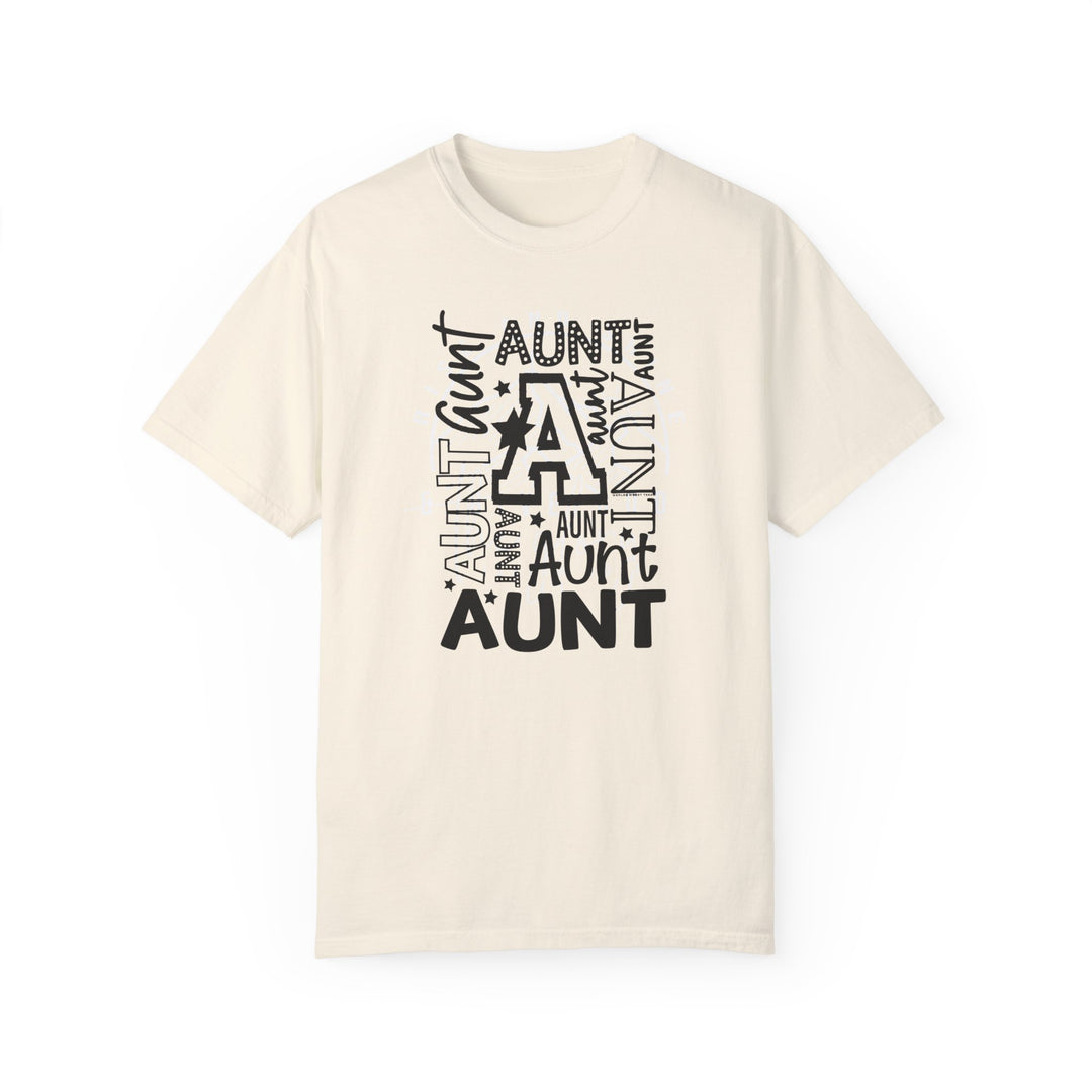 Aunt Tee: A white t-shirt with black text, made of 100% ring-spun cotton. Garment-dyed for extra coziness, featuring a relaxed fit and durable double-needle stitching. Ideal for daily wear.