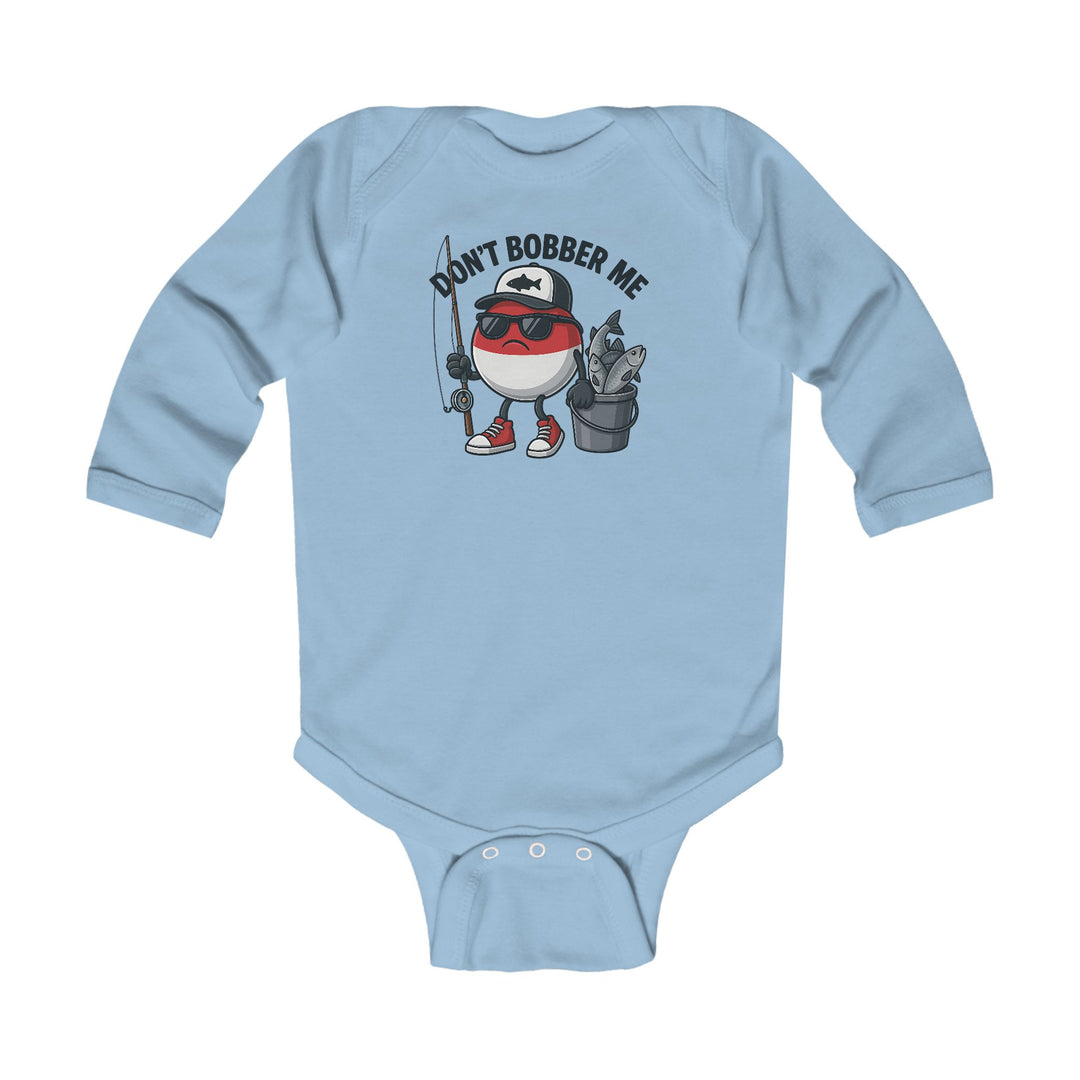Don't Bobber Me Long Sleeve Onesie featuring a cartoon fishing bobber character with sunglasses, cap, and sneakers, holding a fishing rod and standing beside a fish bucket.