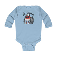 Don't Bobber Me Long Sleeve Onesie featuring a cartoon fishing bobber character with sunglasses, cap, and sneakers, holding a fishing rod and standing beside a fish bucket.