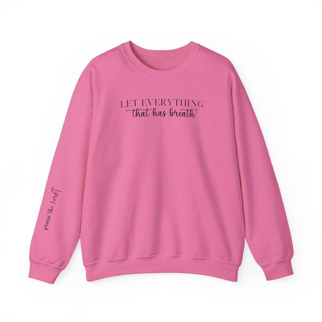 Unisex heavy blend crewneck sweatshirt featuring Let Everything That Has Breath Praise the Lord Crew design. Comfortable fit with ribbed knit collar, double-needle stitching, and tear-away label for itch-free wear. Crafted from 50% cotton and 50% polyester fabric blend.