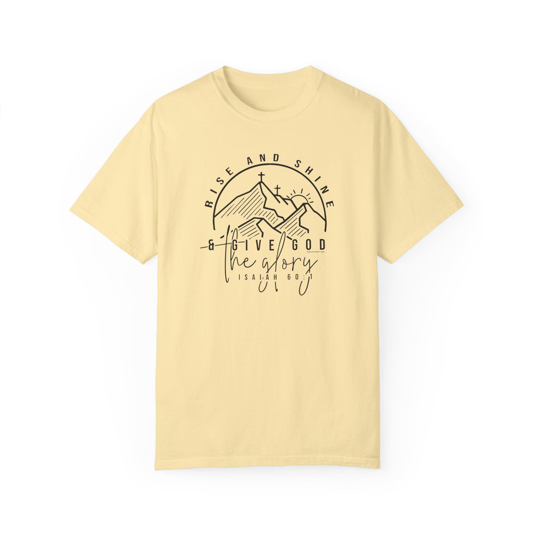 Yellow Rise and Shine Tee, featuring a graphic design with a cross and mountains on 100% ring-spun cotton. Relaxed fit, double-needle stitching, and no side-seams for durability and comfort.