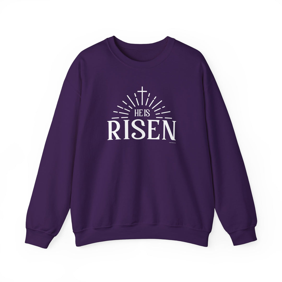 A unisex He is Risen Crew sweatshirt, offering comfort with a ribbed knit collar and durable double-needle stitching. Made from 50% cotton and 50% polyester blend for coziness. Ethically crafted with a classic fit and tear-away label.