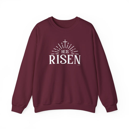 A unisex heavy blend crewneck sweatshirt featuring the He is Risen Crew design. Made of 50% cotton and 50% polyester, ribbed knit collar, and double-needle stitching for durability. No itchy side seams, ethically grown US cotton.