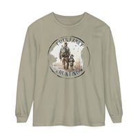 A Faith Family Hunting long-sleeve t-shirt featuring a man and child walking in a field. Made of 100% ring-spun cotton with a relaxed fit for comfort. Ideal for casual wear.