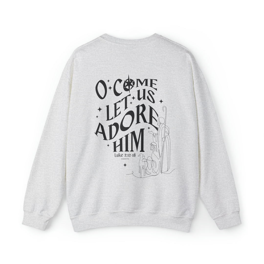 A white crewneck sweatshirt with black text, featuring the design O come let us adore him Crew. Unisex, heavy blend fabric, ribbed knit collar, no itchy side seams. Sizes S-5XL.